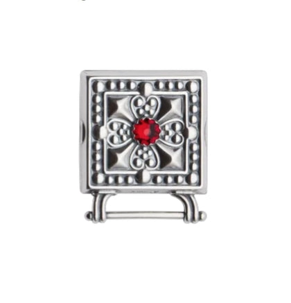 Veskestøl med rød stein, oksidert