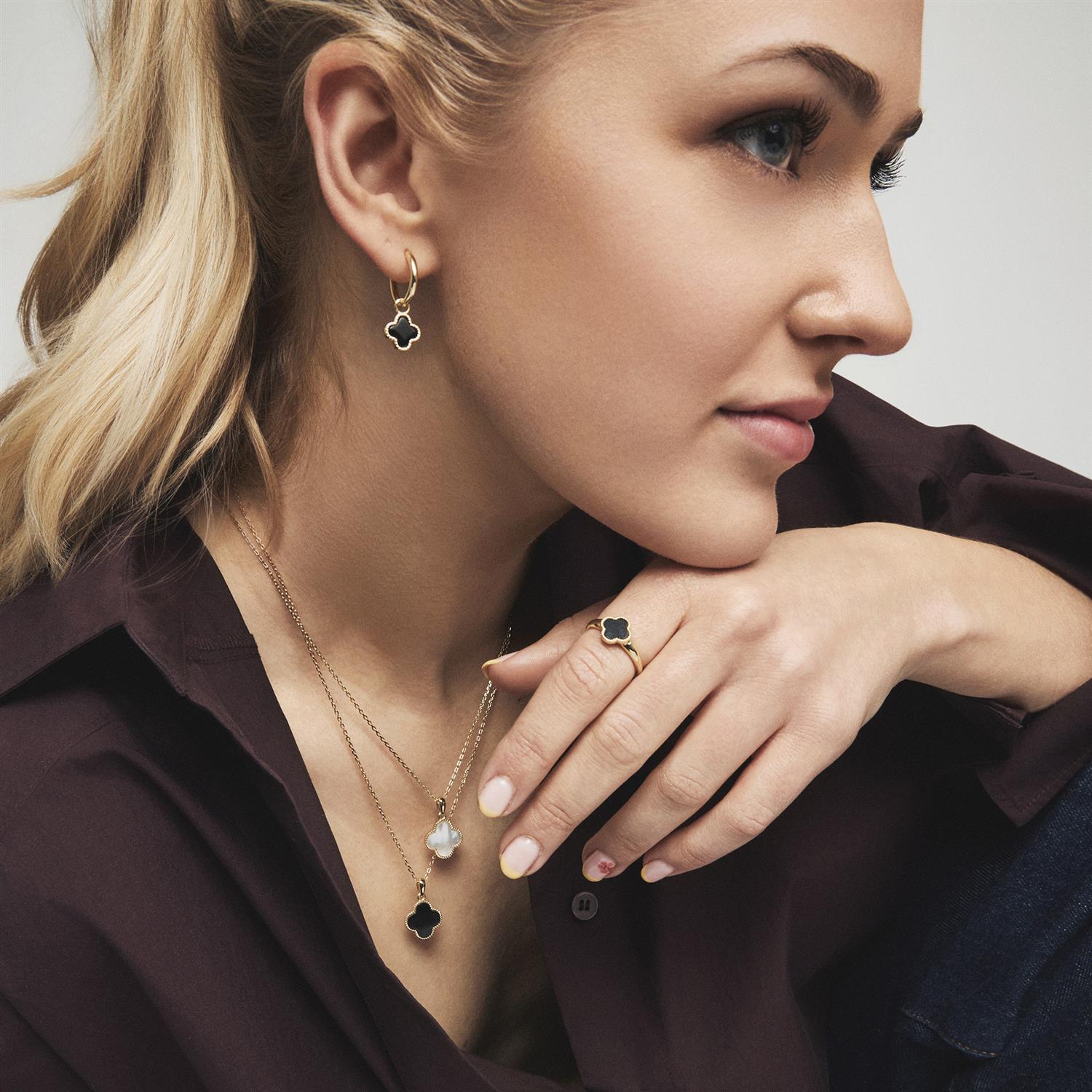 Ring i forgylt sølv, Svart kløver