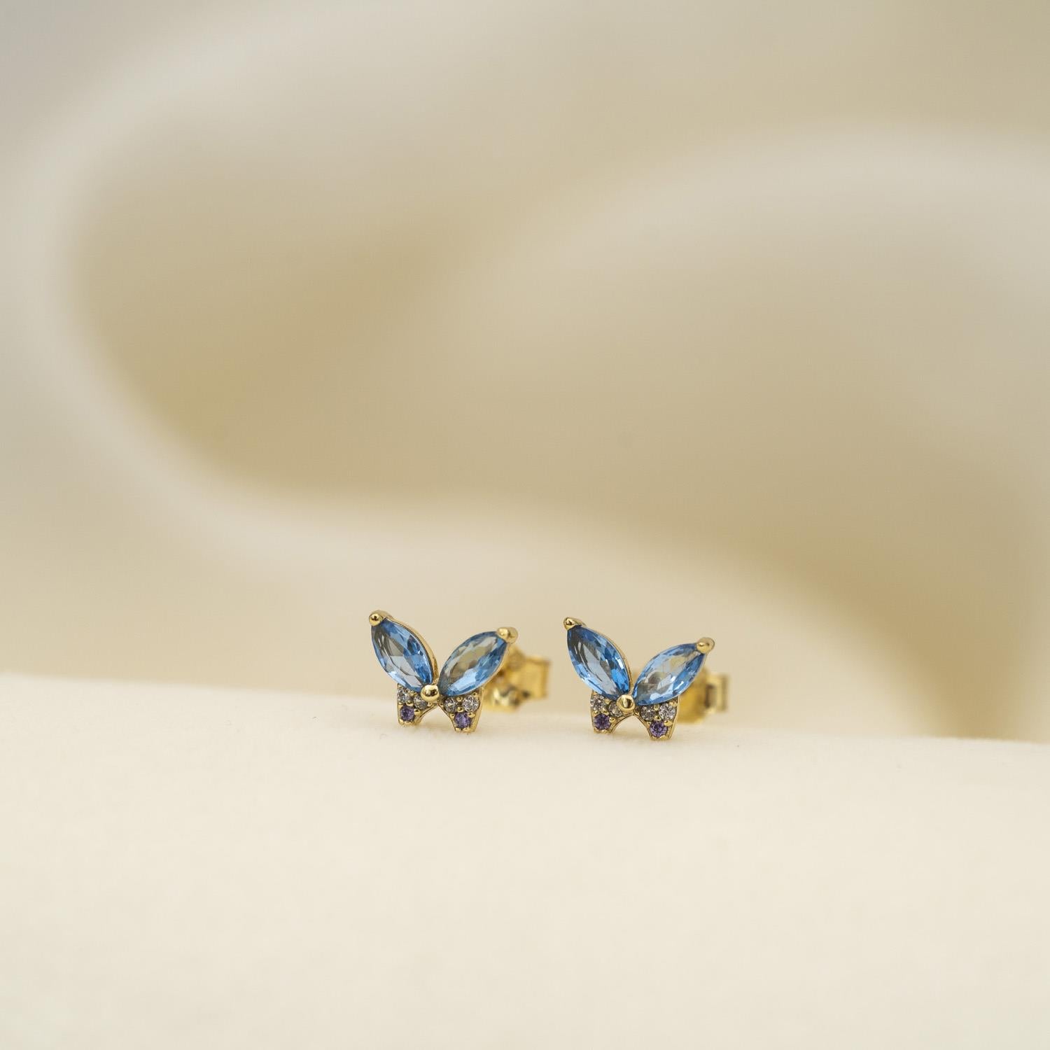 Prins & Prinsesse Øredobber i forgylt sølv med blå sommerfugl