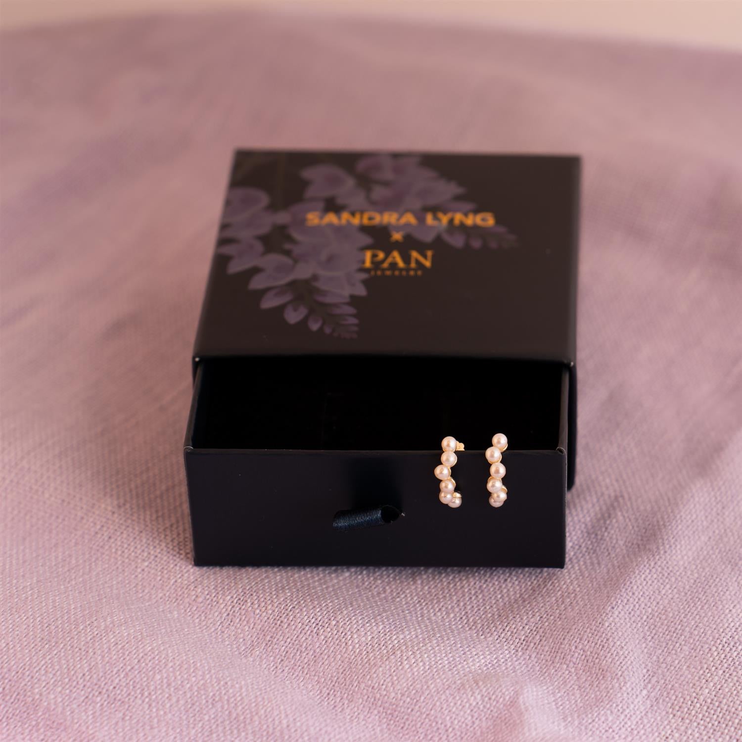 Perlefnugg øredobber i sølv