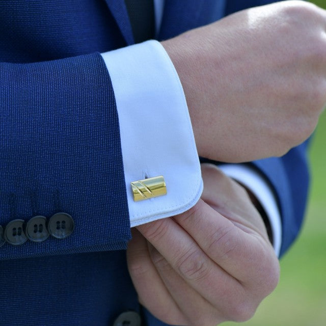 Mansjettknapper i forgylt sølv