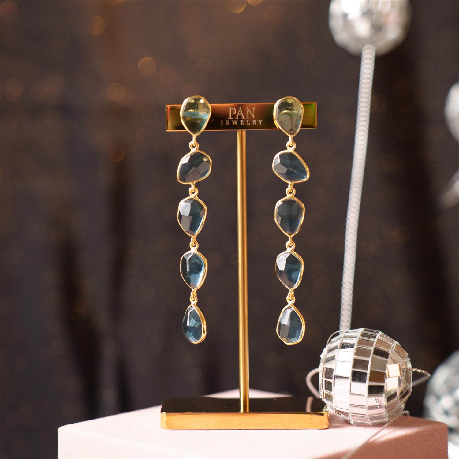 Mirage øredobber med blå stener