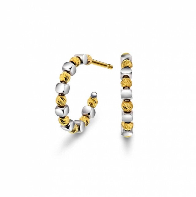 Øreringer i gult- og hvitt gull