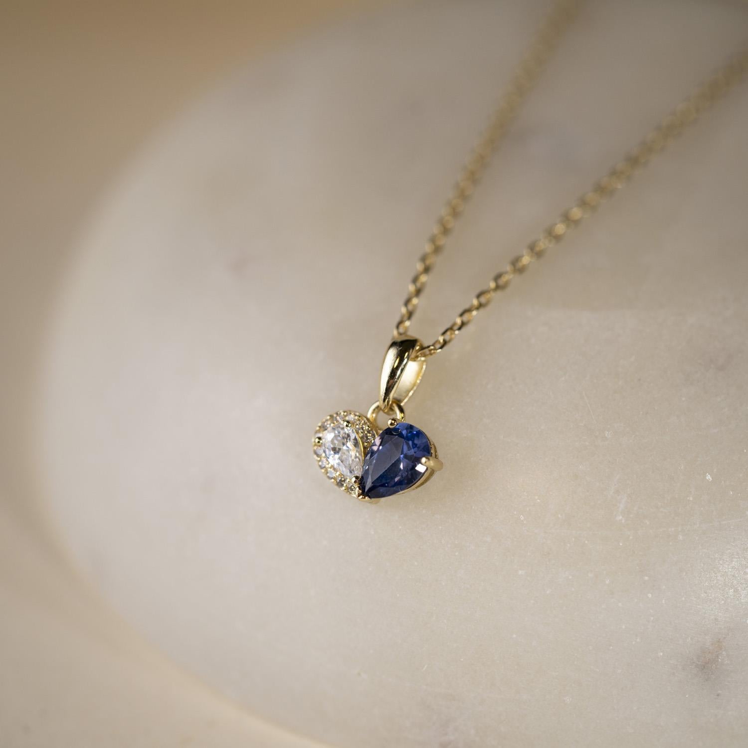 Sammen smykke i sølv med blå/hvit zirkonia