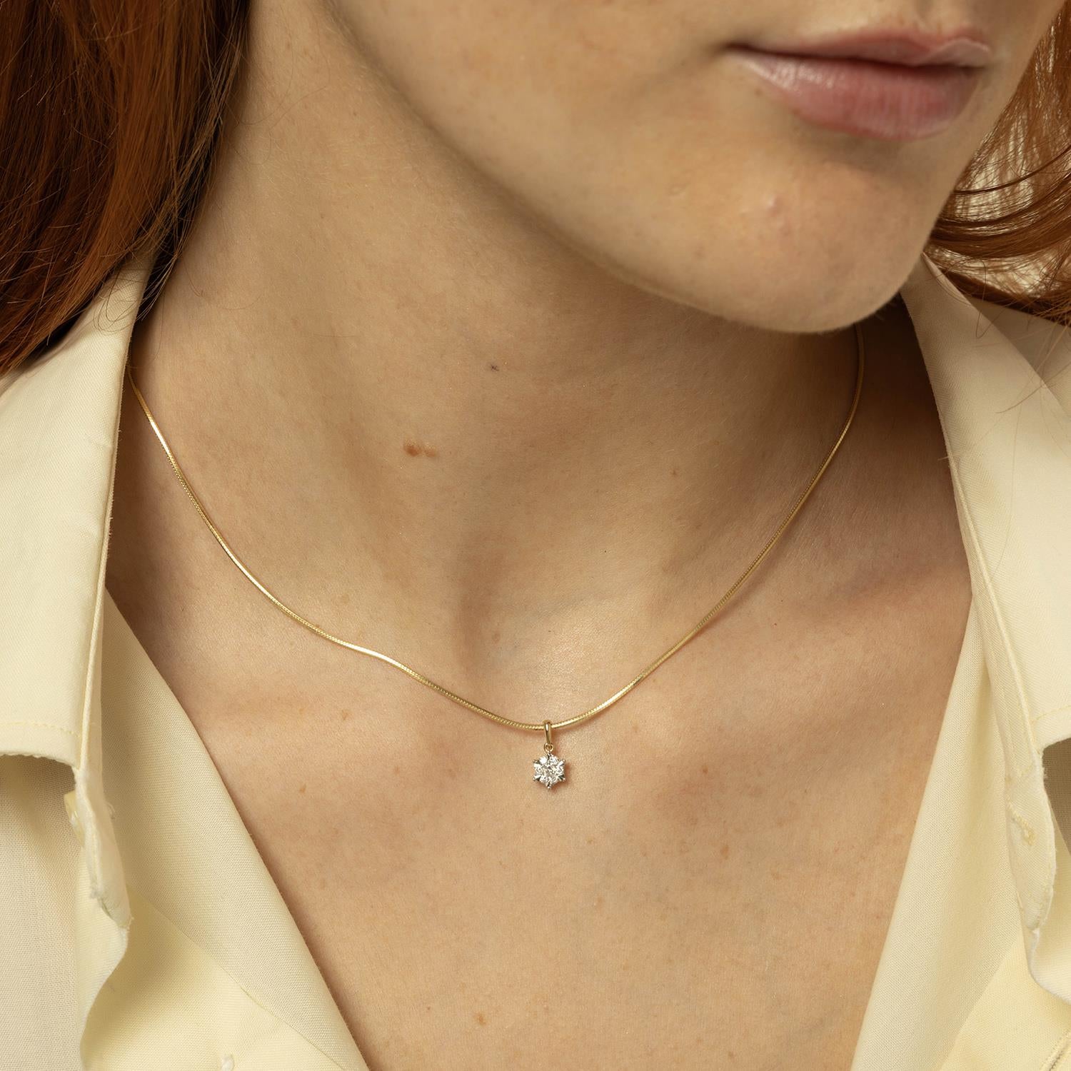 Anheng i gull med diamant 0,15ct WP