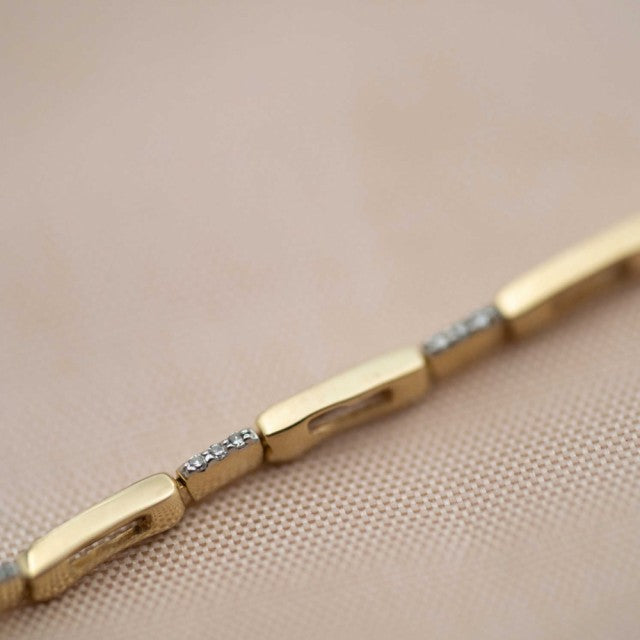 Armbånd i gull med diamanter 0,10 ct WP