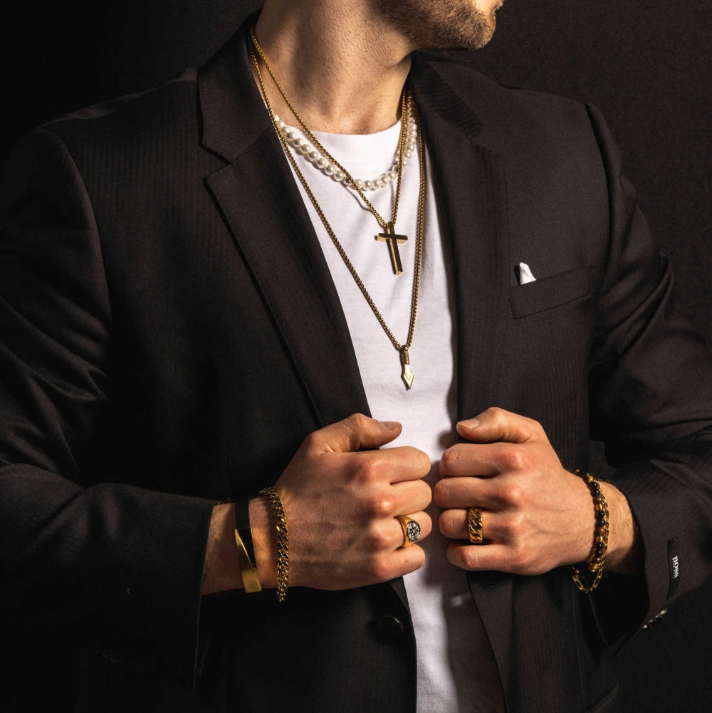 Smykke i forgylt stål, Kors