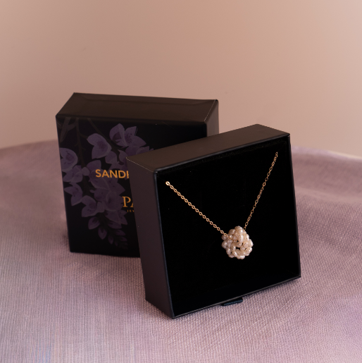 Perlefnugg smykke i sølv