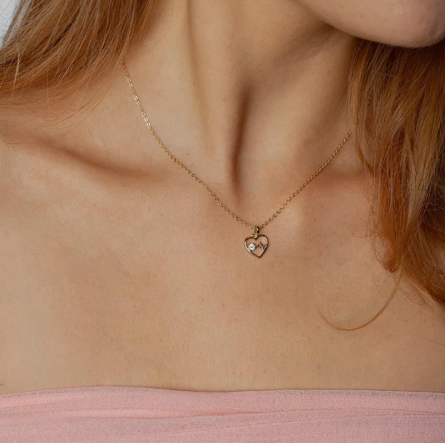 Hjertebank smykke i forgylt sølv