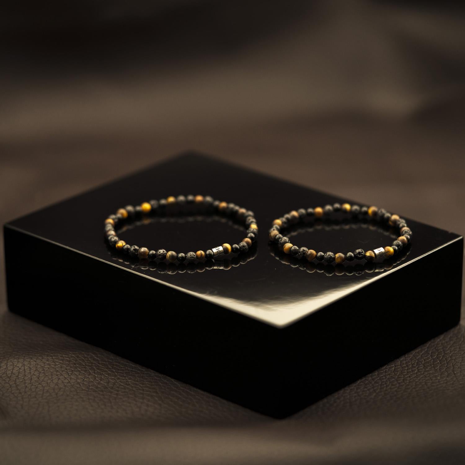 Armbånd i stål med stenperler sort/brun, 20cm